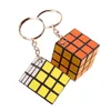 Cubo magico di dimensioni mini 3x3x3 cm con portachiavi Cubo puzzle Gioca a cubi Puzzle Giochi Fidget Toy Bambini Intelligenza Apprendimento Giocattoli educativi