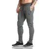 Ny designer Casual man Solid Gym Training Pants Sportkläder Joggare Sportbyxor Män Running Swearing Sweatpants med M-2XL