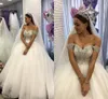 2020 New Bling Ball Gown Abiti da sposa con spalle scoperte Maniche ad aletta con perline di cristallo Princess Court Train Puffy Plus Size Abiti da sposa senza schienale