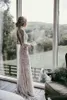 2020 vintage koronkowe sukienki z syreny wiejskiej Wysokie szyję pociąg Seksowne bez pleców przyciski pokrytą plażą ślubną suknię ślubną