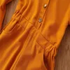 Flickor Jumpsuit Kids Designer Kläder Tjejer Romper Bell Bottom Byxor Mode Långärmad Bodysuits Ins-knapp Overaller Prinsessan Byxor K52