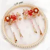 Vintage chinesischer Art-Frauen-Haar-Klipp-Tiara Rotes Kostüm Blume Schritt schüttelt Kopfstück Hochzeit Haarschmuck