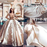 2019 Arabski Luksusowe Satynowe Suknie Ślubne Suknie Ślubne V Neck Illusion Długie Rękawy Koronka Aplikacja Kaplica Pociąg Wedding Suknie Ślubne BC1383
