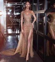 Sexy Illusion Abendkleider Luxus Pailletten Perlen Side Split Gold-Abschlussball-Kleider 2019 Formal roter Teppich trägt