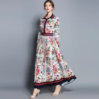 Die beste neue Frauen-Runway-Blumendruck-Taste Vorderes Revers Ausschnitt Plissee-Kleid-Qualität Büro-Dame-reizvolle dünne Abend-Partei-Maxi-Kleid