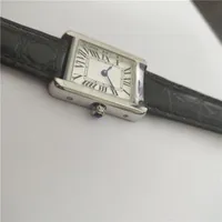 La vendita calda nuova moda in acciaio orologio femminile caso d'argento quadrante bianco uomo vigilanza delle donne del quarzo 053 il trasporto libero