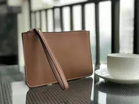 ブランドデザイナー安い高級マネークリップ財布ベストスリム財布PU財布女性のリストレットの財布クラッチバッグジッパーカードバッグ