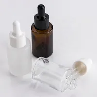Hombro de Vidrio Plano aceite esencial de contenedores 1 onza de color ámbar transparente vidrio esmerilado cuentagotas Botellas de 30 ml con tapón negro Negro