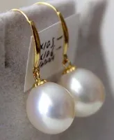 Envío Gratis noble de stunninga par de 11-12mm barroco blanco perla earring14k الطبيعي