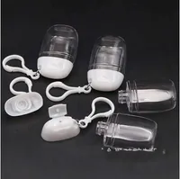 Botella desinfectante de la mano de plástico transparente 30 Ml Botellas gancho de concha compacto precioso Jar portátil de viaje para estudiante Aire libre anillos dominantes 1 2 Hz F2
