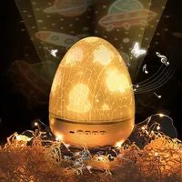Dinosaur 3D Luz Noite casca de ovo Rotating Projetor estrelado romântico Desk Lamp cores mudando presente para as crianças