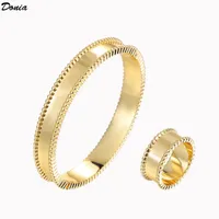 Donia Schmuck Luxus Armreif Party Europäische und amerikanische Mode Vierblatt Kleeblatt Glossy Titan Steel Designer Armband Ring Set Geschenk