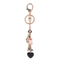 Good Luck Clover keychains Fashion Brands Key Chain Flower Keyrings Metal Key Ring Women Bag Charm Pendant Car Accessories