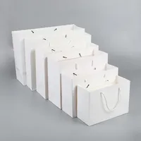 Großhandel horizontale Medium Papiertüten für Geschenk- und Kleidungs ​​Werbung einkaufen Tragetaschen können Logogröße angepasst werden