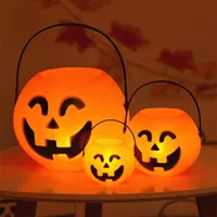Decoración de Halloween Props Suministros de fiesta Smile Face Pumpkin Bolsas de caramelo Cesta LED Linterna Ornamento de artesanía S M L Tamaño disponible Entrega gratuita