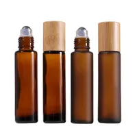 15ml Tom rulle på glasflaskor med bambu keps Stålrulleboll Amber Clear Frosted Glass Essential Oil Perfume Bottle