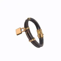 Luxury Jewelry Feminine Leather Designer Bracelet with Gold Heart Brand logo on a high end elegant fashion bracelets with box