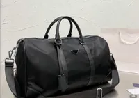 الفاخرة النايلون سعة كبيرة حمل حقيبة يد النساء الرجال حقائب السفر الشهيرة الكتف الكلاسيكية 2022 أكياس القماش الخشن تحمل على الأمتعة