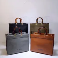 Frauen Luxurys Designer Taschen 2021 Hochwertige Einkaufstasche Ledermaterial Bernstein Doppelgriff Große Kapazität Brief Schulter Damen Geschenk