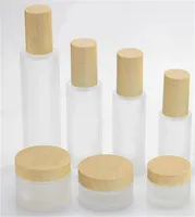 DIYの空の化粧品の瓶のポンプヘッド空の香水ローションボトル木の穀物カバーの曇りガラスサブパッケージのサブパッケージのサブパッケージのサブパッケージのサブパッケージ