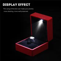 Créatif avec la lumière LED Boîte de bijoux affichage bague pendentif petit cadeau exquis surprise couleur solide couleur personnalité de la mode simple
