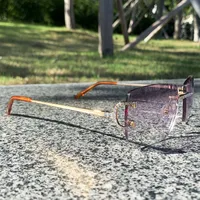 2022 Nieuwe mode steentjes zonnebril eenvoudige draad c iced out frameless voor zowel mannen als vrouwen luxe designer metalen zonnebril rijden brillen decoratie