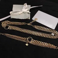 Nuevo collar chapado en oro Juego de joyas Pendientes y pulsera Collar de moda para mujer Collar de cadena larga de alta calidad Suministro
