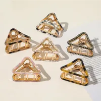 幾何学的な三角形のアセテート中空髪のクリップヒョウ大理石の合金の爪の爪女性の女の子の大型金属ポニーテールクリップ