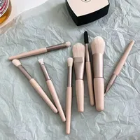 Cosmetic brush, mini makeup, brush, blush, chalk, eye shadow, nose and eyebrows.