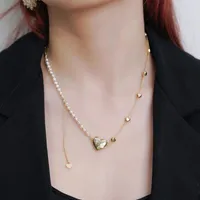 Collares colgantes Mujeres Golden En forma de corazón Pequeño Diamante Trendy Pearl Collar Simple Moda Trend Cadena Retro Joyería Accesorio