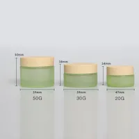 Venta Bien Cosmetic Cream Jar Glass 50G, 1.7 oz Embalaje Verde para BB / Noche con cubierta de madera amarilla