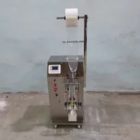 Machine d'emballage à liquide automatique Sauce de soja Machine de remplissage et d'étanchéité de vinaigre d'eau