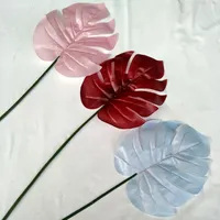 Färgade konstgjorda palmblad Plast Monstera Leaves Dekorativa Blommor För Bröllopsväg Ledande Konstgjorda Växter För Heminredning 155 N2