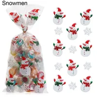 Juldekorationer 50pcs Merry Candy Bags Santa Claus Plast Treat Bag Korg Xmas År Biscuit Presenter