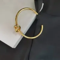 Fshion дизайнеры браслет браслет манжеты высокого качества ретро мужская и женская открытая титановая сталь браслетов личности простой концентрический узел браслет золотом