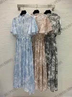 20222ss Yaz Tasarımcı Bayan Elbiseler Uzun Yelek ile Ceket Tropikal Orman Baskı Düğmesi Sinek Küçük Ayakta Yaka Bel İpli Tasarım Kısa Kollu Etekler