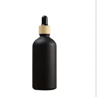 Botellas de almacenamiento Frascos 100pcs / lote Botella de aceite esencial 5ml 10ml 15ml 20ml 30ml 50ml negro anillo de bambú helada negro Vidrio de gotero líquido original