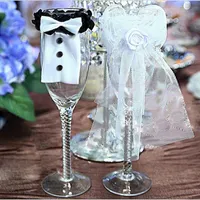 美しい結婚式のパーティーの装飾2つの部分1つのセット花嫁の新郎ホワイトTuxブライダルベールシャンパンフルートワイングラステーブルの装飾DIY