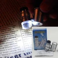 Minibrier do microscópio mini 60x Moeda portátil que detecta com LED e luz UV e caixa de varejo de cor