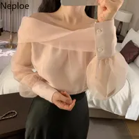 Женские блузки Рубашки Nelloe Сексуальные женщины Свободные с длинным рукавом Смотреть через корейский элегантный темперамент Slash Sece Cross Blusas Mujer de Moda