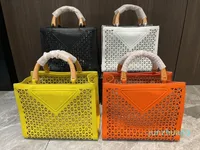Diseñador- bolsas bolsas de moda Totes de moda recorte hueco Tote Bolsa de playa Viajes de vacaciones Triángulo de gran capacidad Bolsos