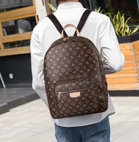 2022 Kvinnliga män ryggsäck uxury designer totes mode handväskor axelband väskor bokstäver blixtlås vanligt fack myntväskor SALEOFF01