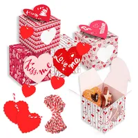 12 unids / set Supplies de fiesta Día de San Valentín Abrazo Béseme Caja de regalo de galletas rosa Regalos de pareja de dibujos animados tridimensionales