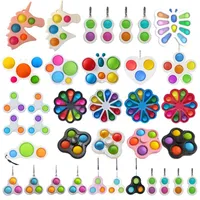 26 estilos de los estilos Fun Fidget Bubble Toys Push Simple Dimple Key Ring Sensory Squeeze Balls Bubbles Llavero Unicornio Flor Mariposa