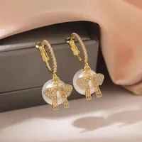 Baumeler Kronleuchter Koreaanse Kristall Perle Stud Oorbellen Vrouwen eenvoudige Boog Oorbel Mode Oor Sieraden Huwelijkscadeau