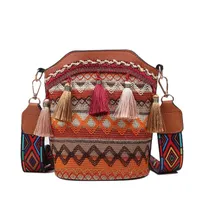 Nieuwe mode vrouwelijke tas herfst en winter etnische stijl persoonlijkheid een-schouder messenger bag kwastjes geweven emmer tassen