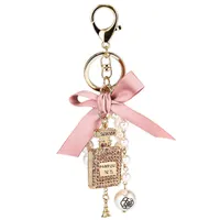 Mode imitation pärla parfymflaska nyckelring bil nyckel ring kvinnor väska charm tillbehör söt båge nyckelkedja kreativa nyckelringar g1019
