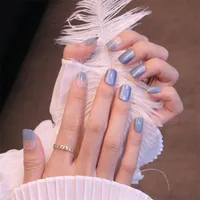 Falsas Nails 24pcs Set Glitter Catseye Opal Ombre Blue Fingernail Jelly Gel Stick en falso SXY-31