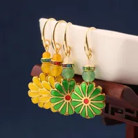 Dangle kroonluchter mode antieke gele kristallen zon bloem oorbellen vintage groene emaille druppel voor vrouwen en meisjes sieraden