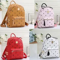 Leather Handbags High Quality 2 size men women School Backpack famous Rivet printing Backpack Designer lady Bags Boy and Girl back pack